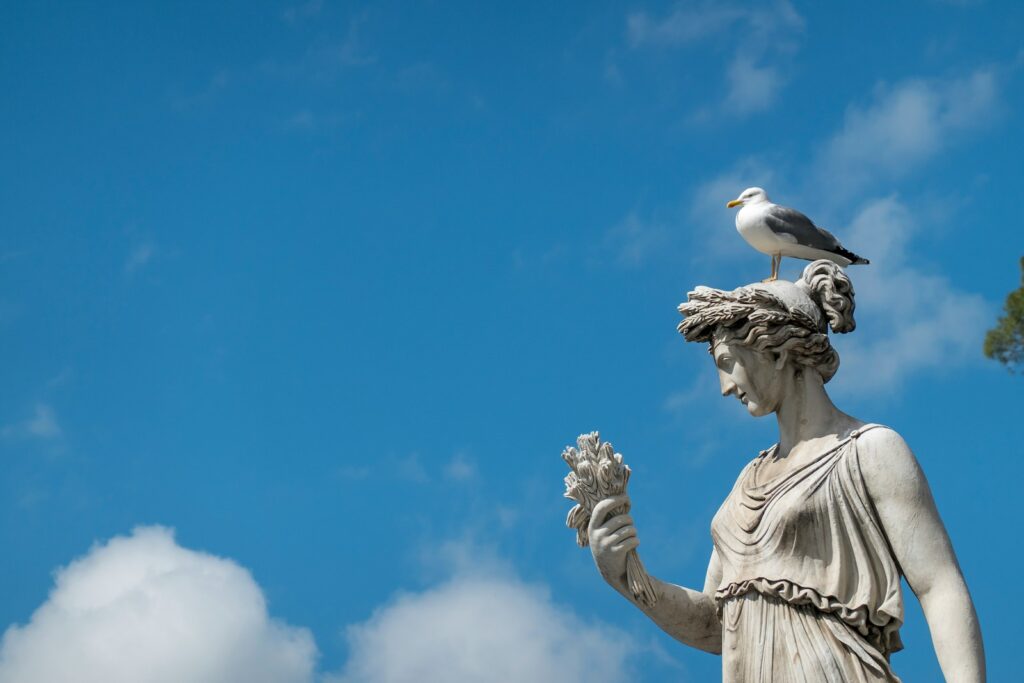 angel statue under blue sky during daytime